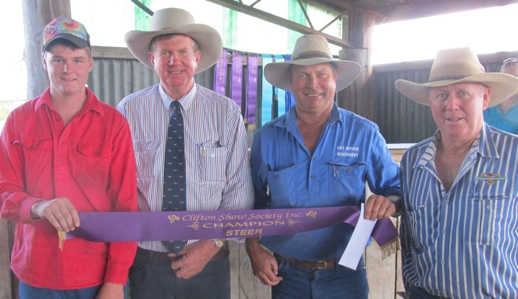 Sam Weier (left) accepts the ribbon for Champion Steer of the 2016 Clifton Show from judge, Pat McMahon, Warwick, sponsor, Lindsay Ruhle, of Ray Bunch Machinery, and chief steward, Brian Gillam. Photo Contributed